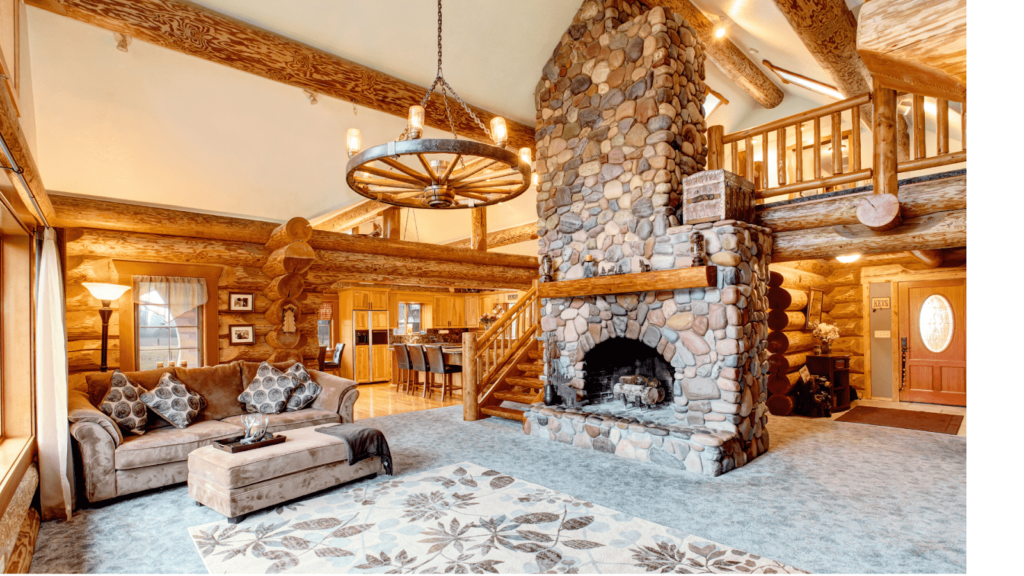 Cozy log cabin living room with a stone fireplace and wooden stairs in the Poconos.